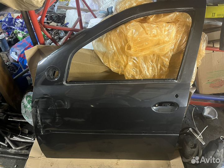 Дверь водительская renault logan 1