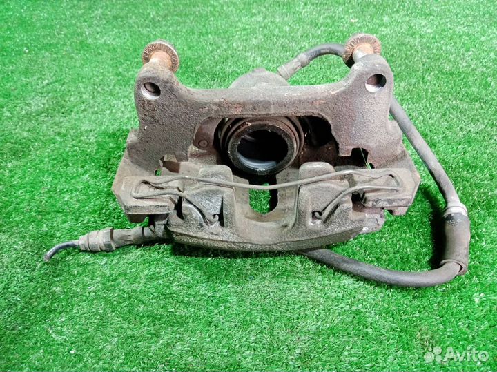 Суппорт тормозной передний правый Volkswagen Golf