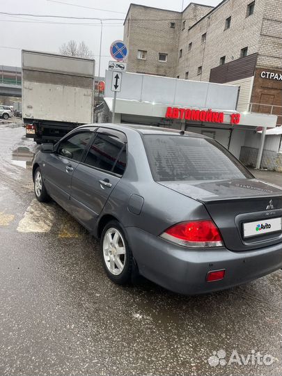 Mitsubishi Lancer 1.6 AT, 2005, 241 500 км