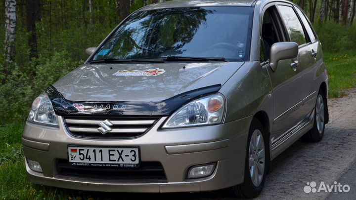 Заднее стекло на Suzuki Liana Замена