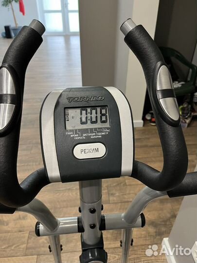 Эллиптический тренажер torneo