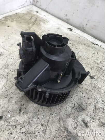 Моторчик отопителя Opel Astra