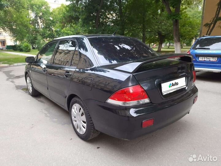 Mitsubishi Lancer 1.6 МТ, 2006, 220 000 км