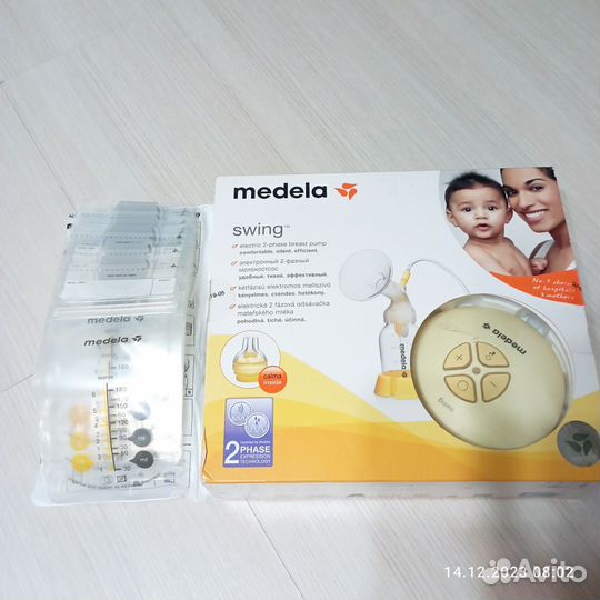 Новый Молокоотсос Medela электрический двухфазный