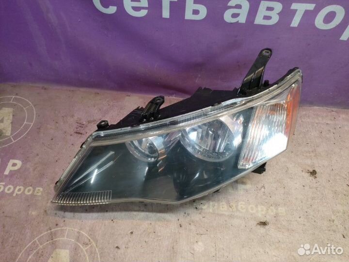 Фара галогеновая левая Mitsubishi Outlander Xl