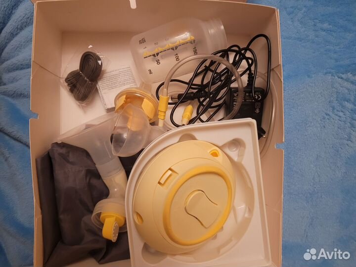 Молокоотсос medela swing электрический
