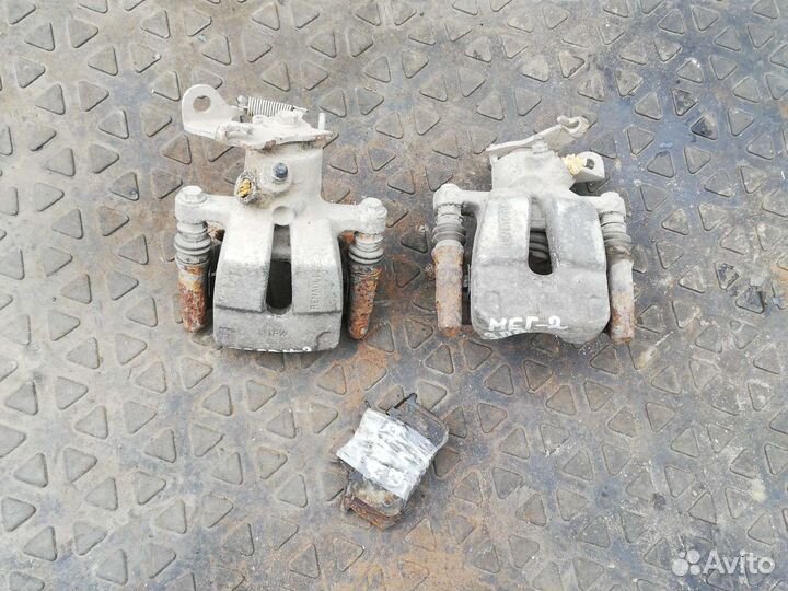 Суппорт тормозной задний Рено Меган 2