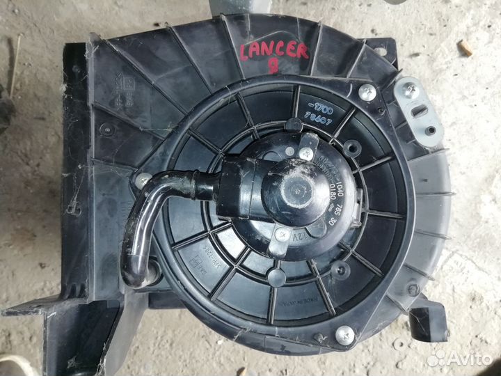 Моторчик печки Мицубиши Лансер 9