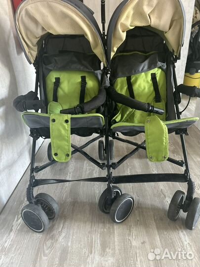 Коляска для двойни погодок