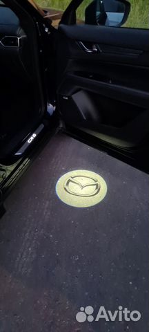 Mazda CX5 KF Подсветка в двери проекция C850V7540A
