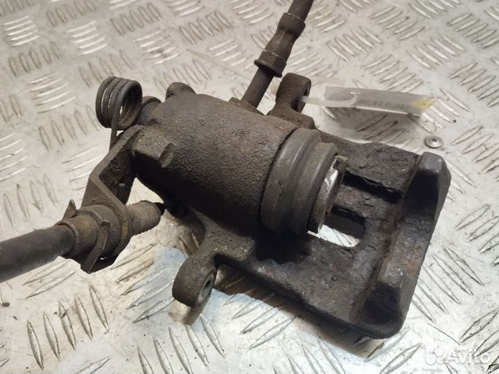 Суппорт задний левый Volkswagen Sharan 95-00