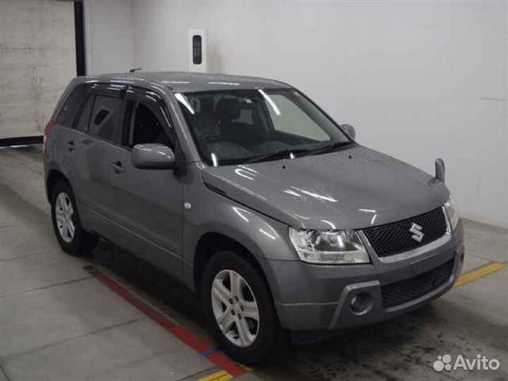 Суппорт передний правый Suzuki Escudo TD54W J20A