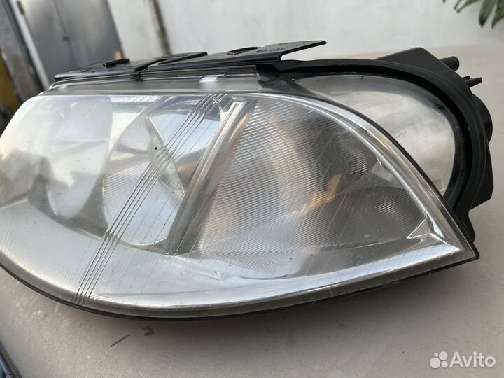 Фара левая volkswagen passat b5