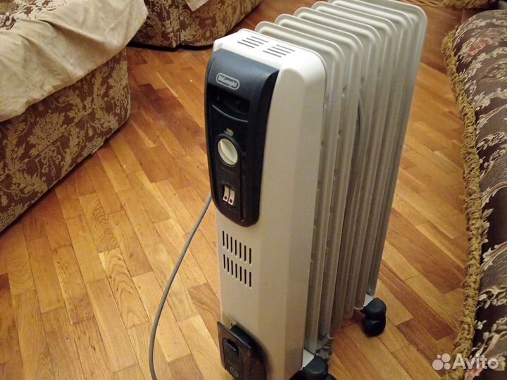 Масляный обогреватель delonghi