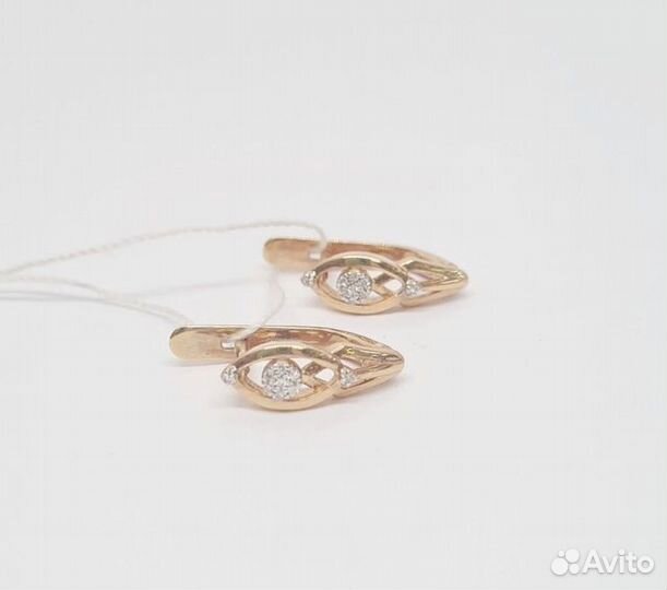 Золотые серьги с камнем