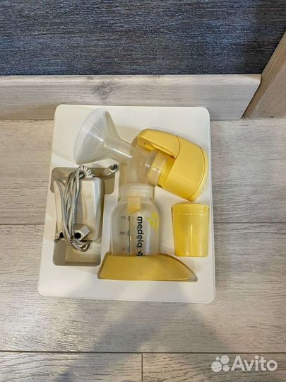 Молокоотсос электрический