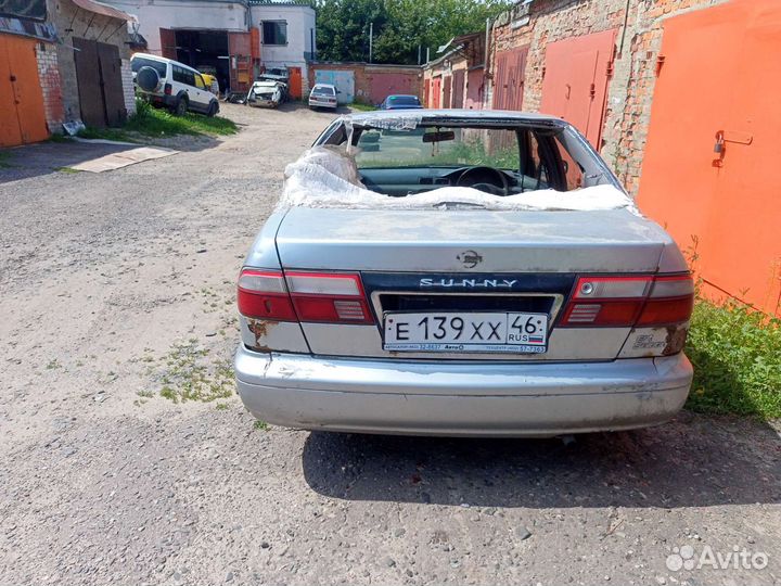 Салон Nissan Sunny B14
