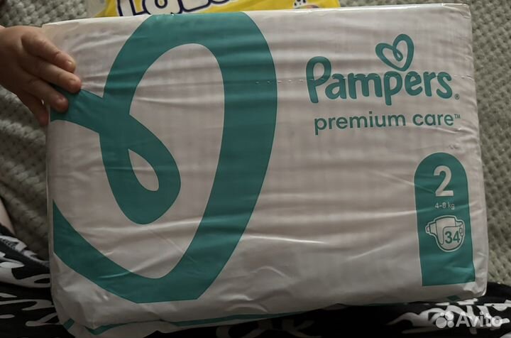 Продам pampers premium care 2 и lalaku 2