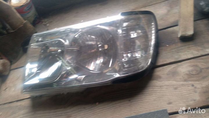 Toyota land cruiser 100 стекло фары