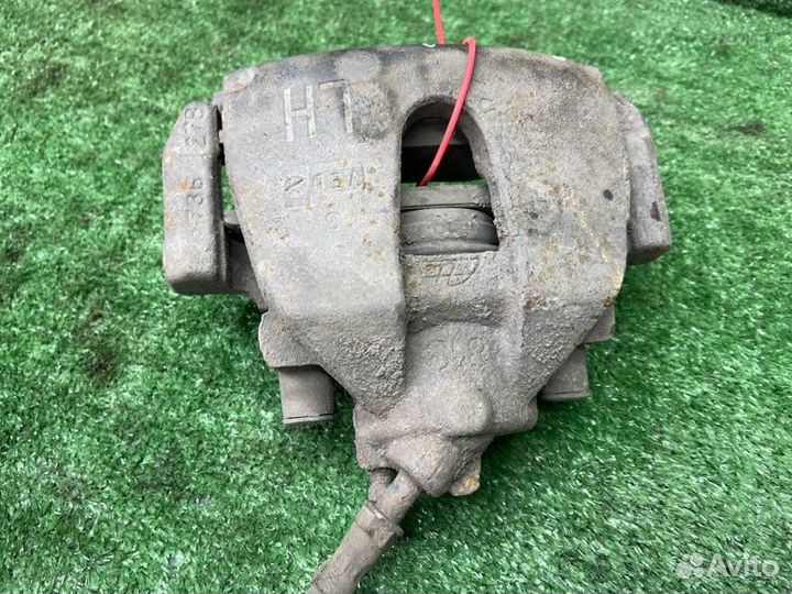 Тормозной суппорт передний левый Ford Focus 2