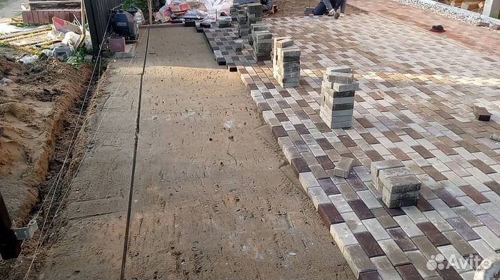 Укладка тротуарной плитки брусчатки