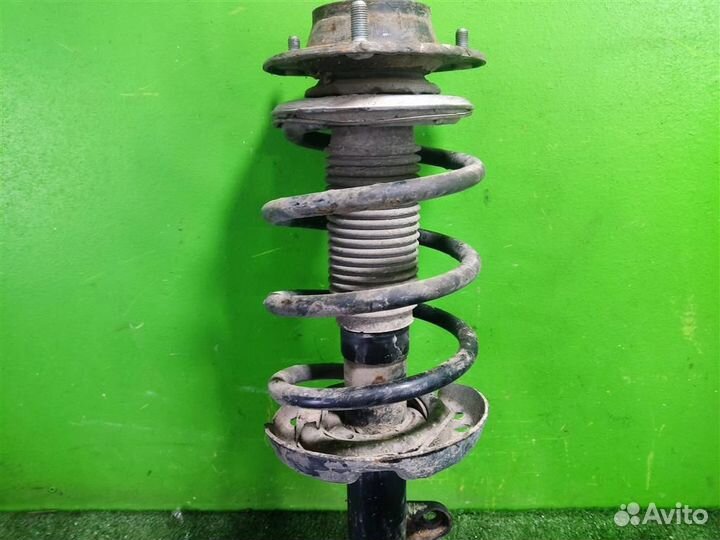 Стойка амортизатора передняя левая KIA Sportage 2