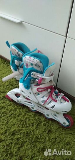 Роликовые коньки