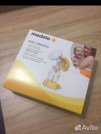 Молокоотсос medela электрический