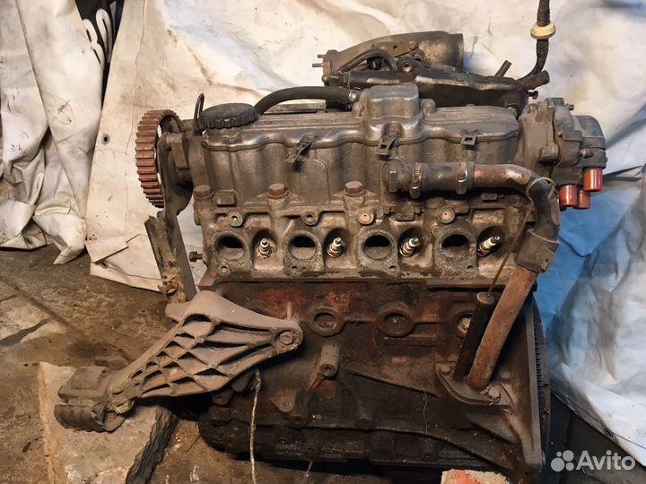 Двигатель C20NE