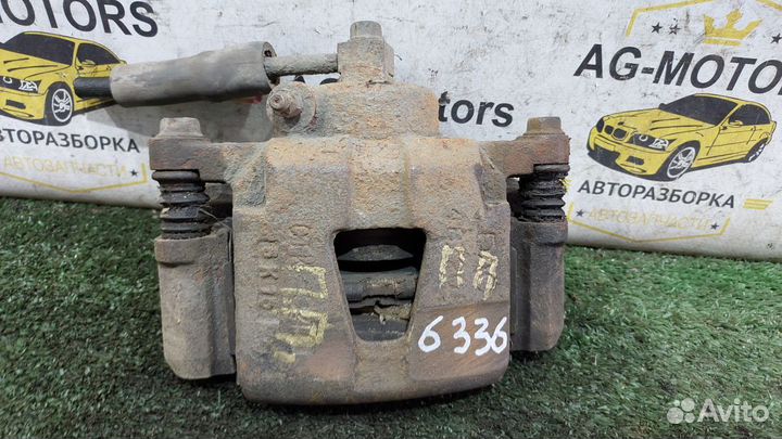 Супорт тормозной передний правый Шевроле Ланос