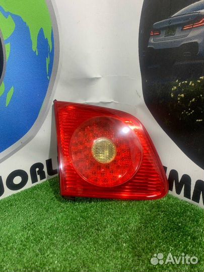 Фонарь крышки багажника левый Volkswagen Phaeton