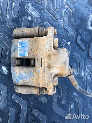 Тормозной суппорт передний левый Renault Logan