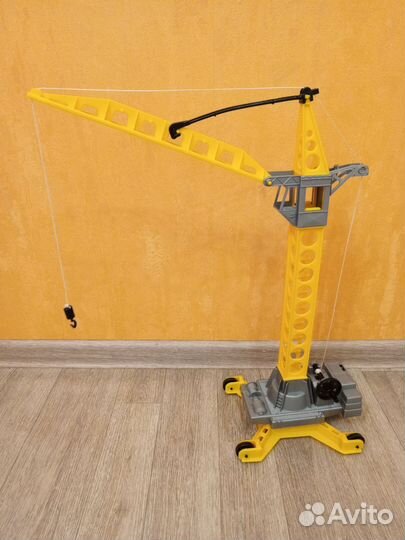 Подъемный кран игрушка
