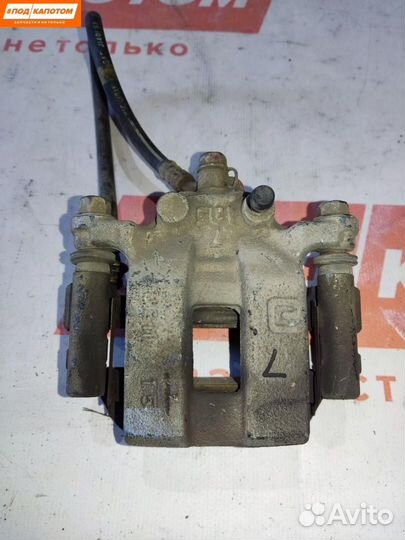 Суппорт тормозной задний левый Suzuki Grand Vitara