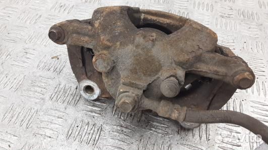 Суппорт тормозной передний правый opel astra J (5L