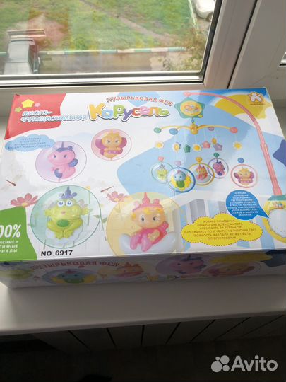 Музыкальная карусель на кроватку