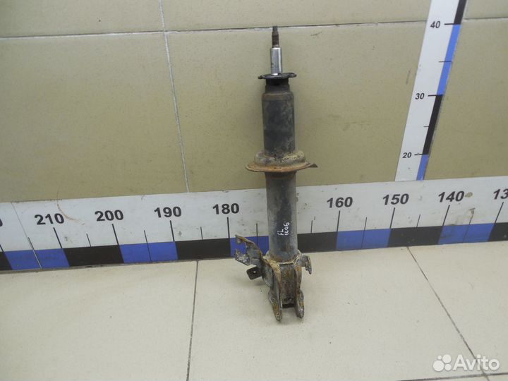 Амортизатор передний левый Micra (K11E) 1992-2002