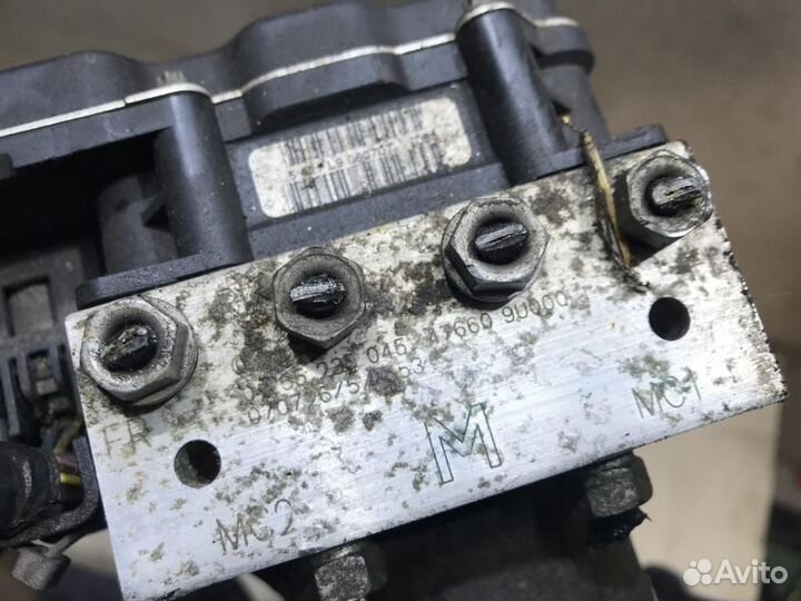 476609U000 Блок ABS Nissan Note