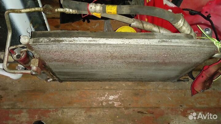 Радиатор кондиционера на Шевроле Авео т 200