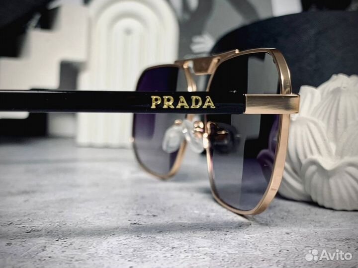 Очки Prada золотые