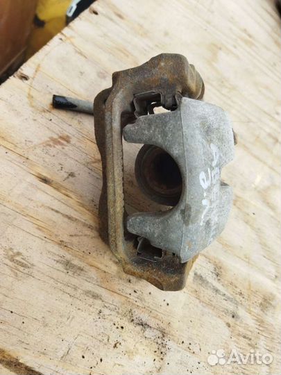 Суппорт тормозной задний Тойота Авенсис 250