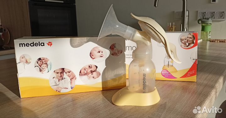 Молокоотсос medela