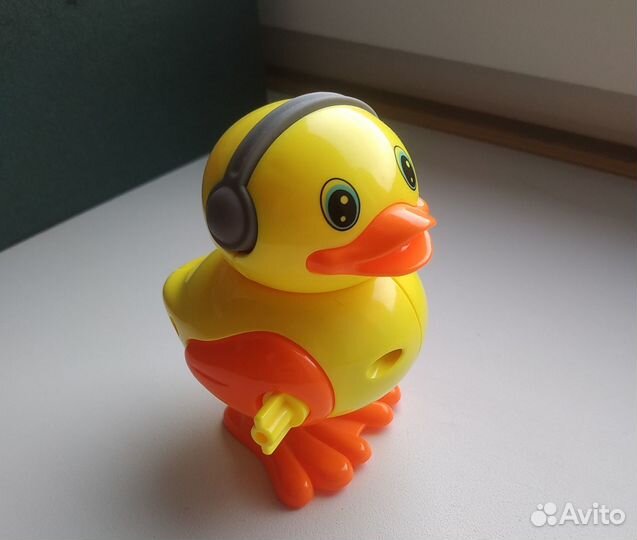 Игрушка заводной утенок
