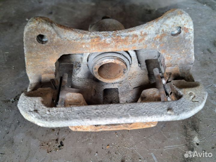 Суппорт задний Chevrolet Lacetti