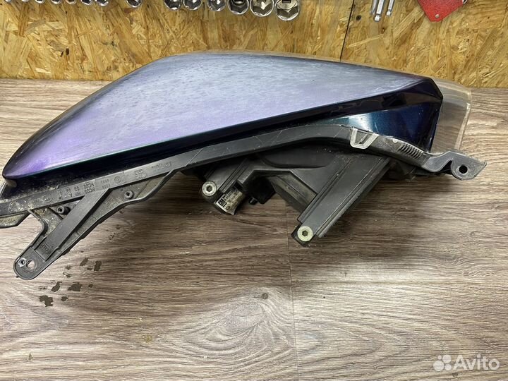 Фара левая Opel Astra H