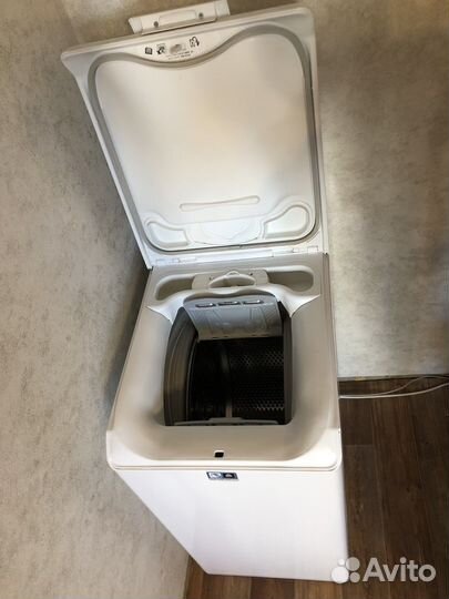 Стиральная машина с вертикальной загрузкой