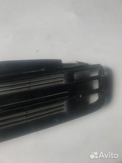 Заглушка бампера передняя правая Nissan March AK12