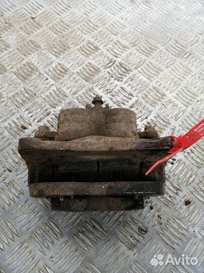 Суппорт передний левый Subaru Impreza GE3 1.5