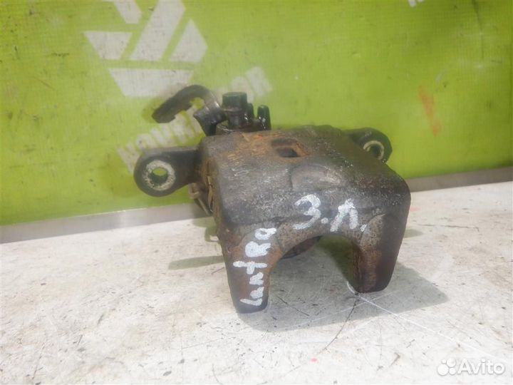 Суппорт задний левый Хендай Лантра 96-00