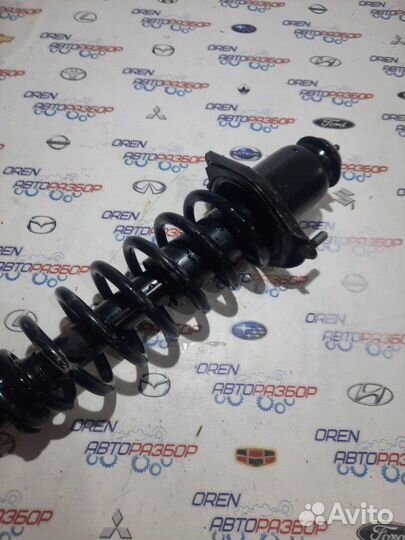 Стойка подвески задняя правая Geely Emgrand Ec7